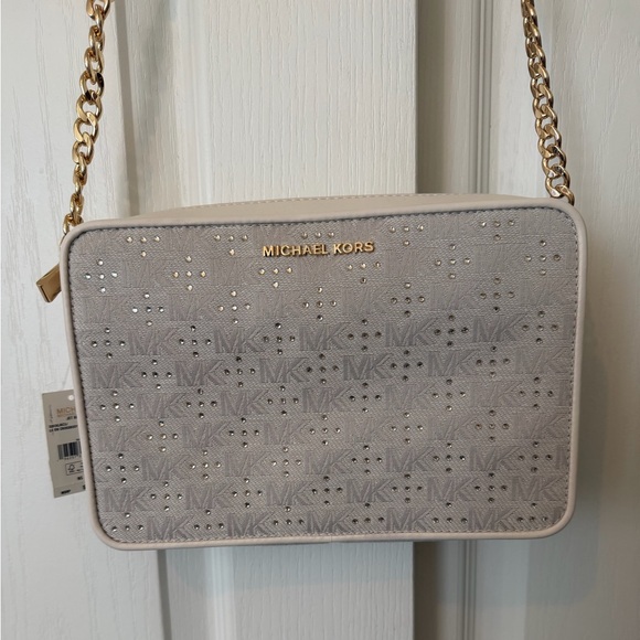 Michael Kors Handbags - Michael Kors Natural Cream Jet Set Crossbody Bag